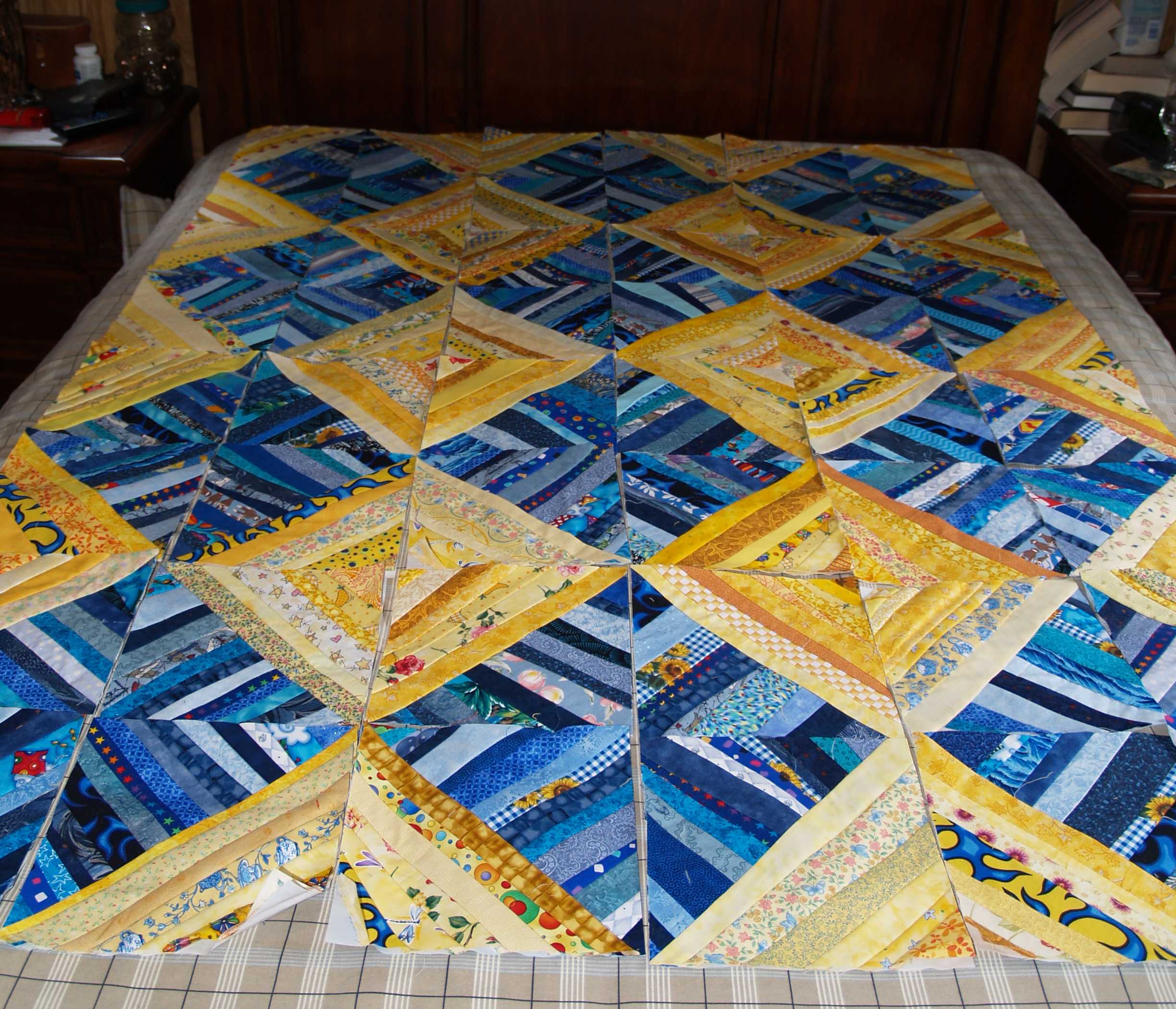 blue and yellow quilt covers